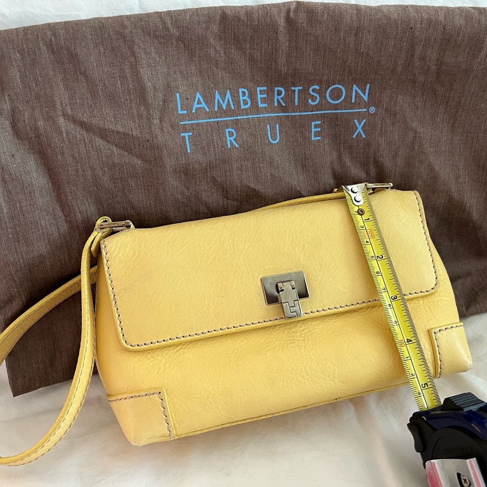 Lambertson Truex Leather small yellow purse with unique closure. Dust bag inc.